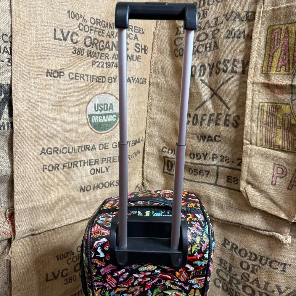 Sydney Love Stepping Out Rolling Duffel Bag Carry On Luggage Overnight Travel